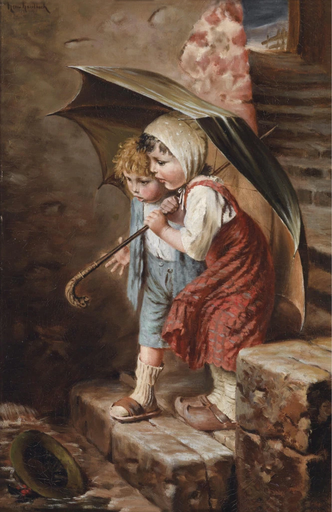 Bimbi sotto la pioggia